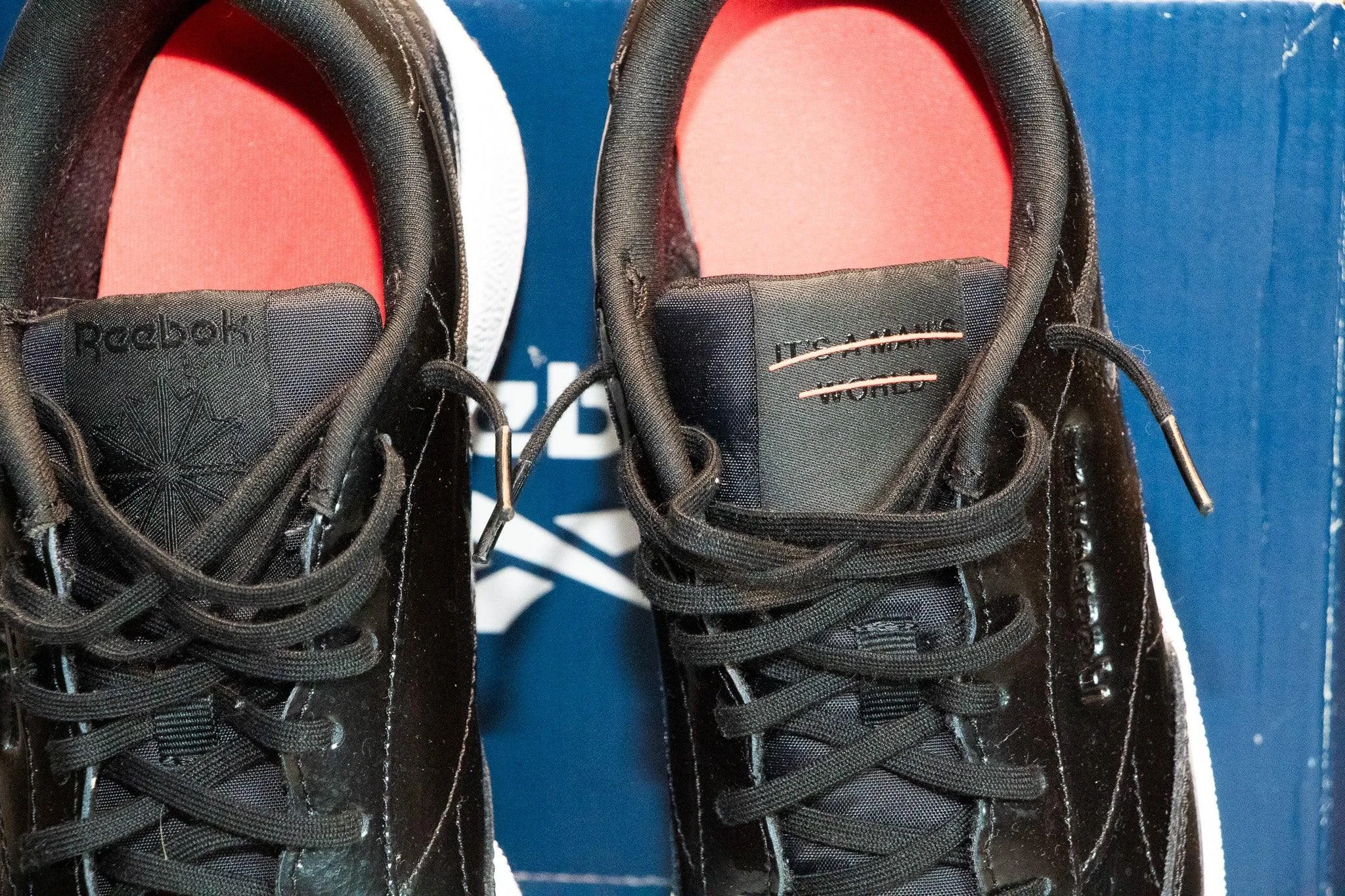 Reebok Women's Classic Club C 85 It's A Mans World Patent Leather